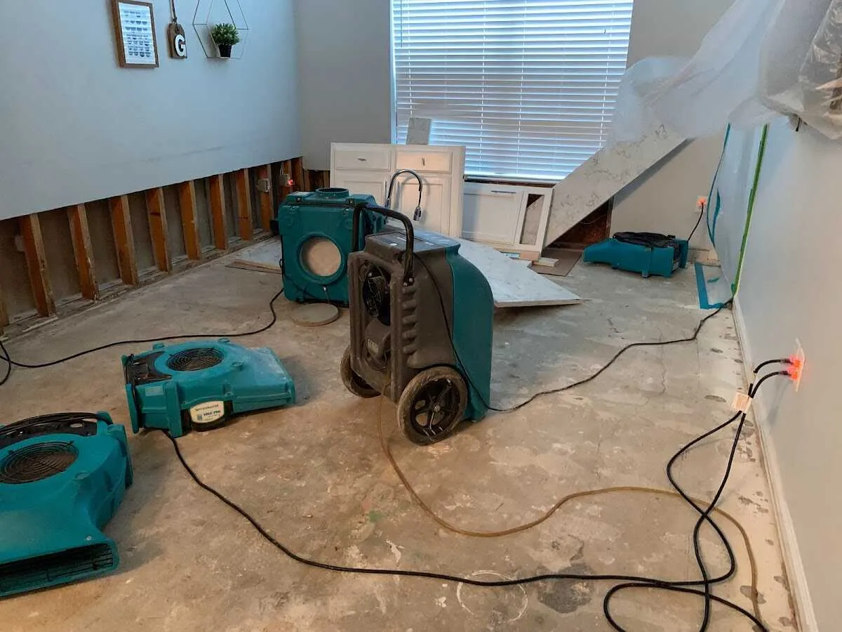 Dehumidifier in flood-cut room for Water Damage Restoration in Rochester Hills